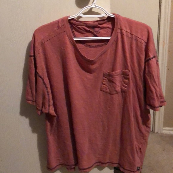 I am selling a men’s t-shirt that is pink shirt - Picture 1 of 2